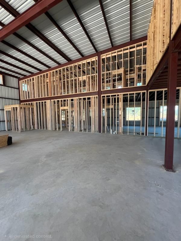 Metal building interior framing with mezzanine